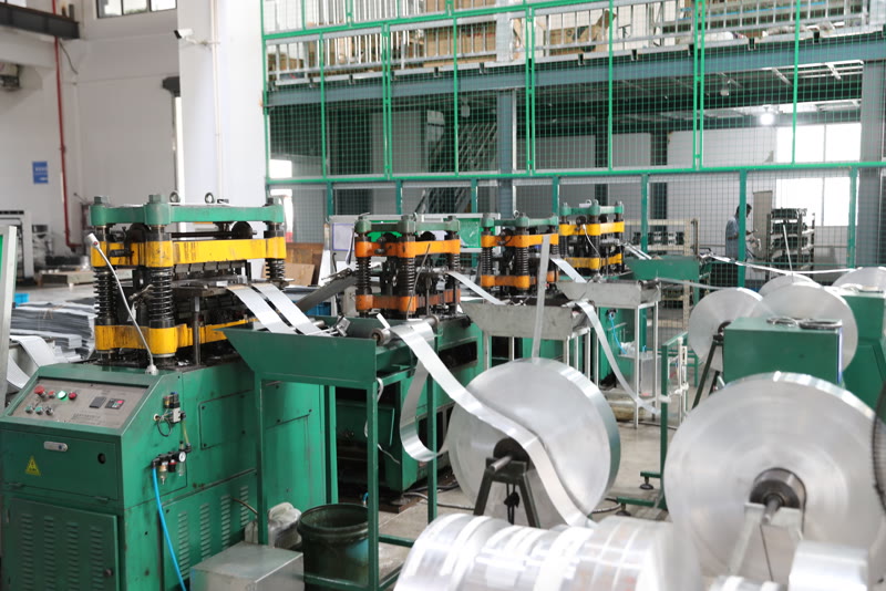 Aluminum tube-fin forming and CAB brazing line